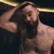 Travis Kelce has got Taylor Swift fans hot under the collar on social media after a viral video showed him topless with a towel wrapped around his waist pic