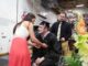 In an inspiring display of love and determination, She helped her paralyzed boyfriend stand up to get his degree… Watch the Video